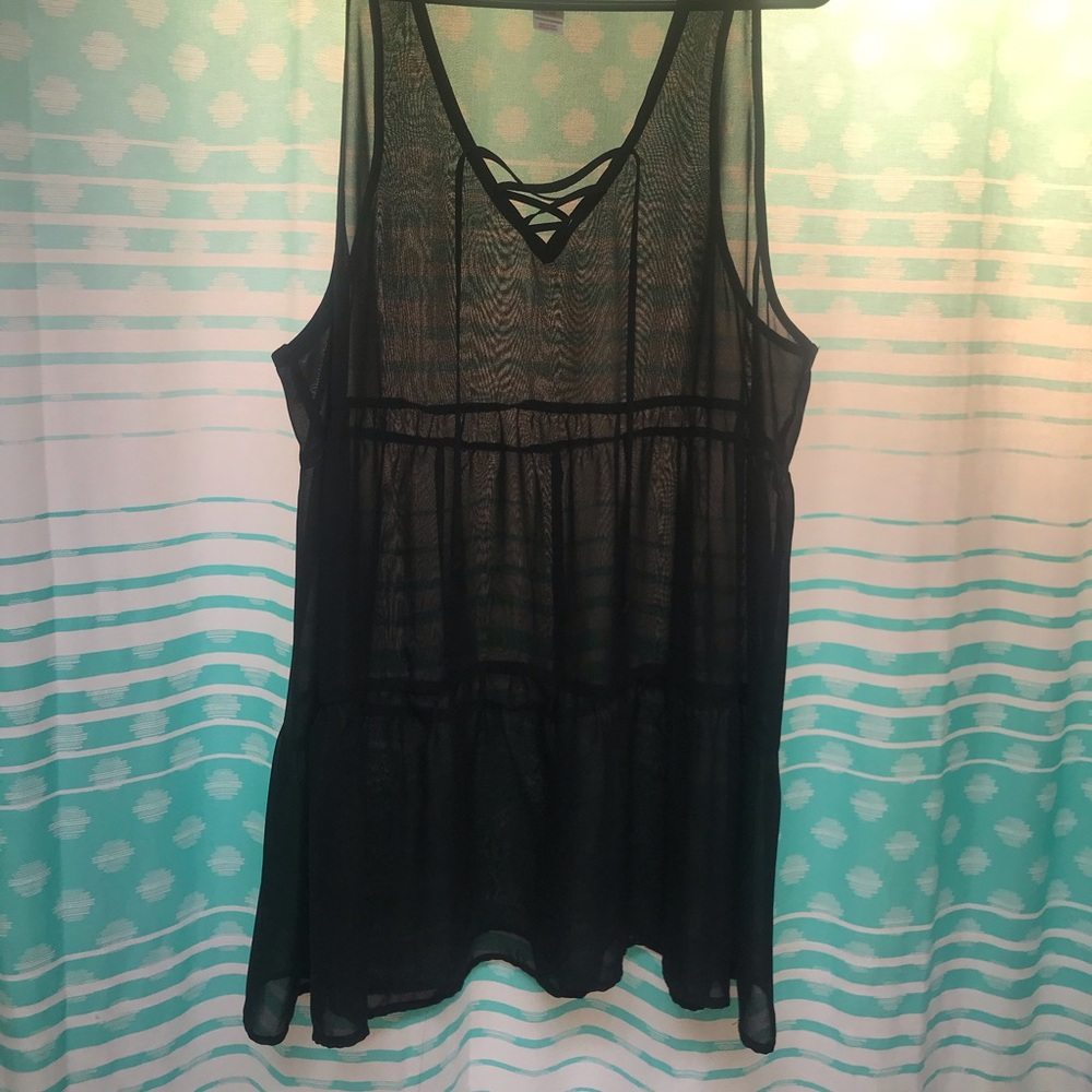 Black sheer bathing suit cover.,